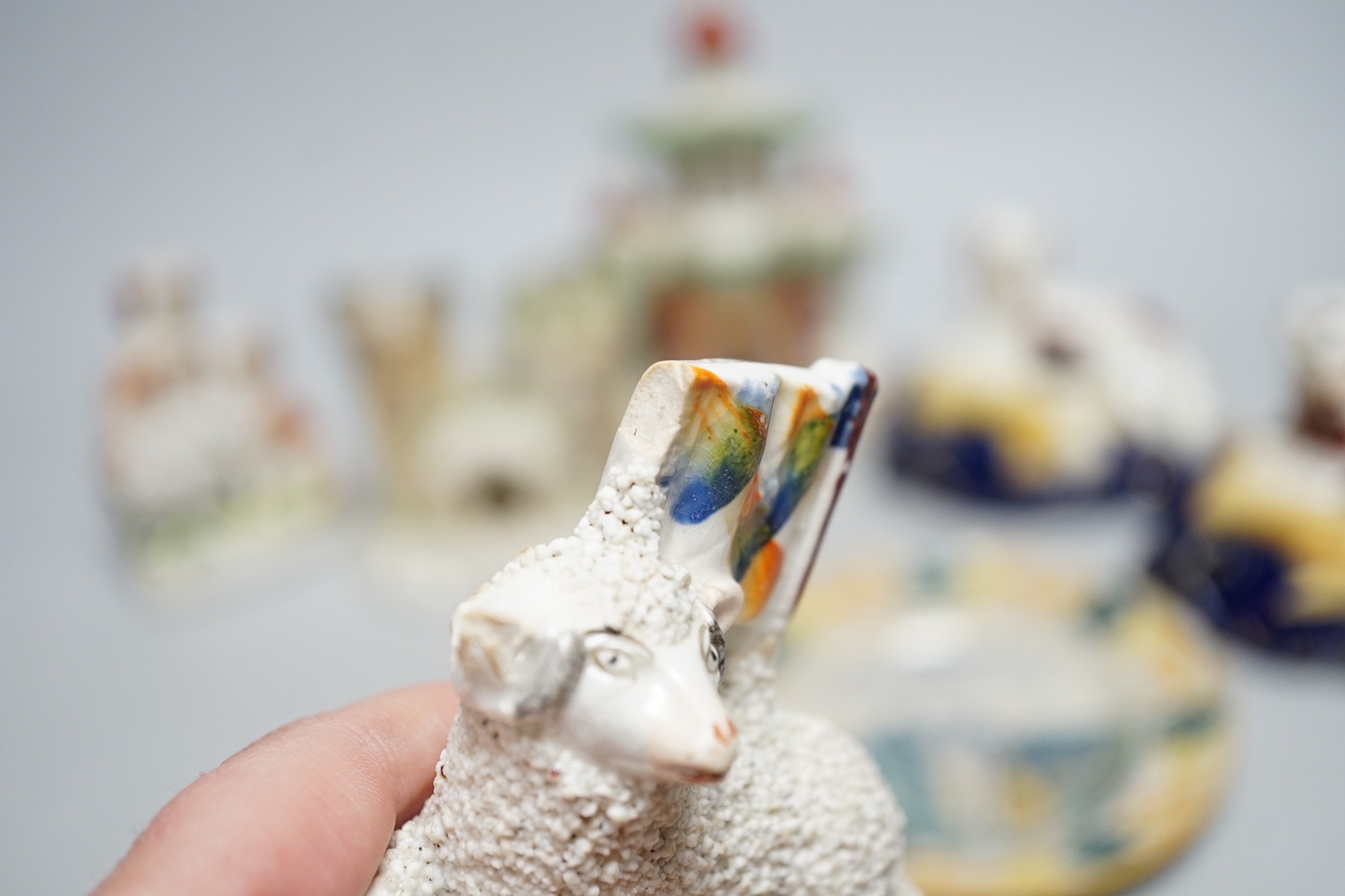 A pair of 19th century Staffordshire King Charles Spaniel pen holders and two pearl ware plates etc (8)